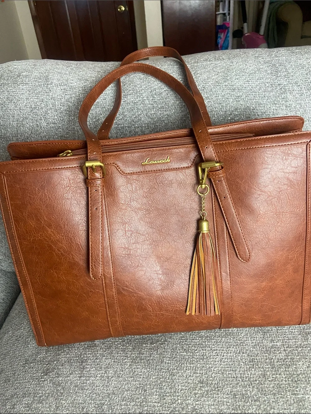 Leather-Textured Tan Tote with Tassel Accent for laptop work